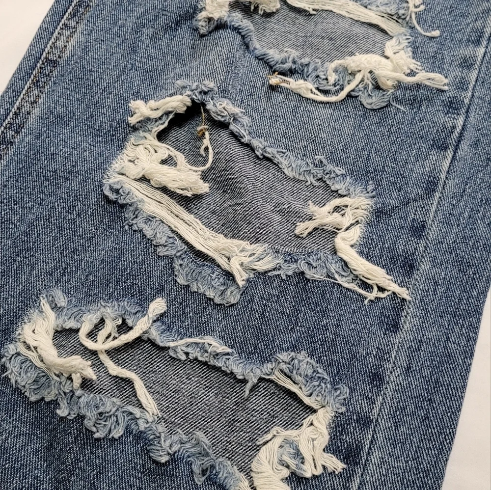 Women's Distressed Blue Jeans